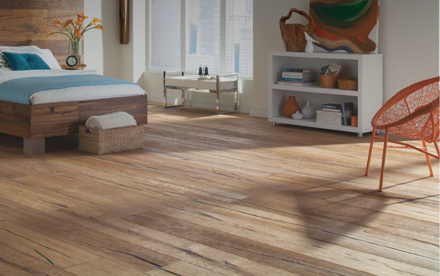 Bedroom with wood floor to demonstrate Integrity's expertise in the flooring industry